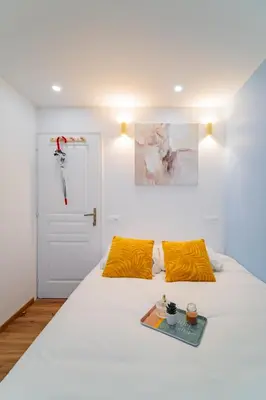 Un ou plusieurs lits dans un hébergement de l'établissement Paris - Blue Sky Homestay