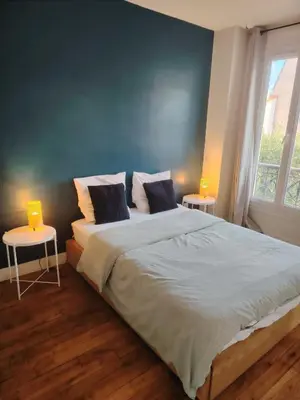 Un ou plusieurs lits dans un hébergement de l'établissement Grand appartement 2 Piece Centre Metro Mairie Marché