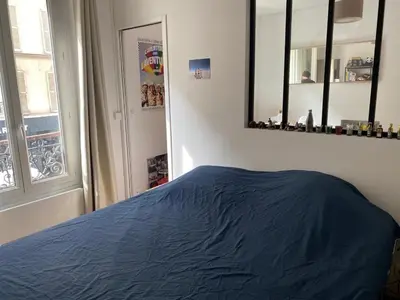 Un ou plusieurs lits dans un hébergement de l'établissement Bright 2-room fully equipped - Porte de Clichy