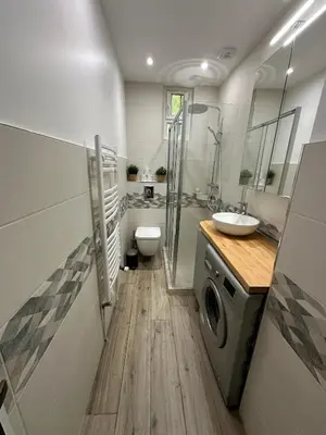 Salle de bains dans l'établissement Appartement rénové avec jardin et parking Métro ligne 14 à proximité, environnement calme