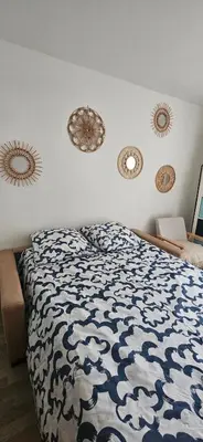 Un ou plusieurs lits dans un hébergement de l'établissement A cozy room