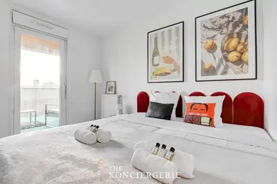 Un ou plusieurs lits dans un hébergement de l'établissement Appartement spacieux et confortable - Malakoff