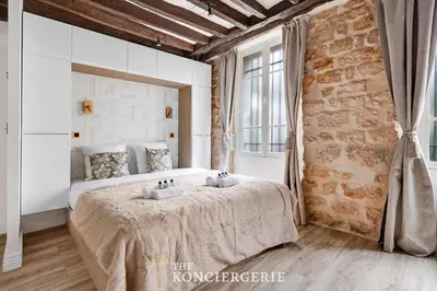 Un ou plusieurs lits dans un hébergement de l'établissement Ecrin de prestige au coeur du Haut-Marais