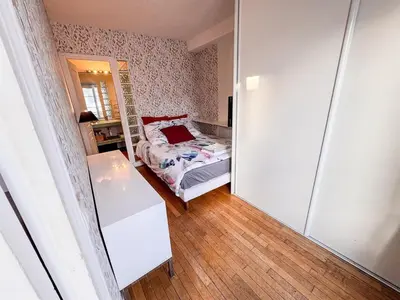 Un ou plusieurs lits dans un hébergement de l'établissement 11 Historic Le Sentier flat near Louvre & Metro