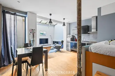 Télévision ou salle de divertissement dans l'établissement Appartement design & confortable avec terasse