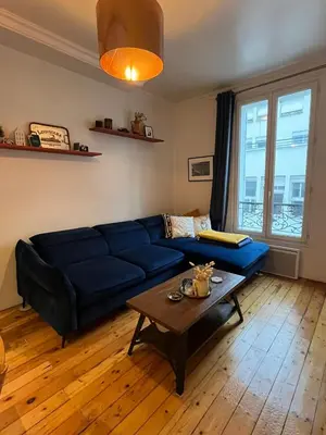 Coin salon dans l'établissement Charming Appartment 9th Arrondissement