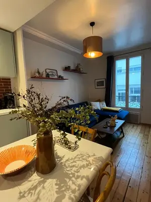 Coin salon dans l'établissement Charming Appartment 9th Arrondissement