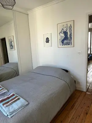 Un ou plusieurs lits dans un hébergement de l'établissement Charming Appartment 9th Arrondissement