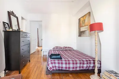 Un ou plusieurs lits dans un hébergement de l'établissement La Belle Vie à Paris - with balcony