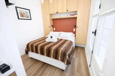 Un ou plusieurs lits dans un hébergement de l'établissement Appartement coeur paris 16 avec terasse - 2P
