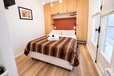 Un ou plusieurs lits dans un hébergement de l'établissement Appartement coeur paris 16 avec terasse - 2P