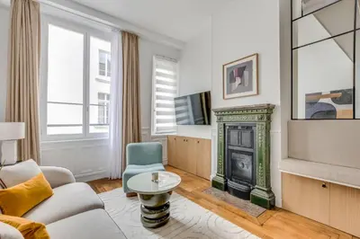Télévision ou salle de divertissement dans l'établissement Pick A Flat's Apartment in Louvre - Rue Coquillère