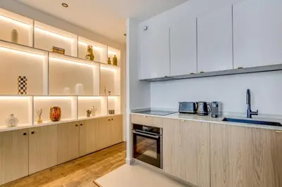 Cuisine ou kitchenette dans l'établissement Pick A Flat's Apartment in Louvre - Rue Coquillère