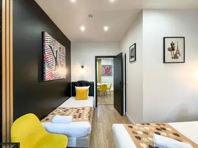 Coin salon dans l'établissement UrbanFlat 158 - Cosy Apartment in the center of Paris