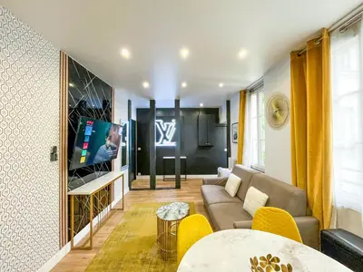 Télévision ou salle de divertissement dans l'établissement UrbanFlat 158 - Cosy Apartment in the center of Paris