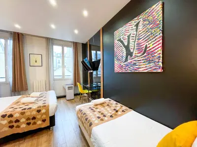 Un ou plusieurs lits dans un hébergement de l'établissement UrbanFlat 158 - Cosy Apartment in the center of Paris