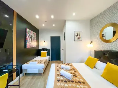 Un ou plusieurs lits dans un hébergement de l'établissement UrbanFlat 158 - Cosy Apartment in the center of Paris