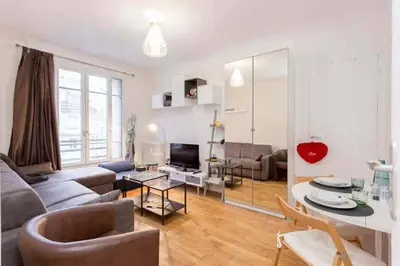 Coin salon dans l'établissement Panoramic Studio with Eiffel Tower View