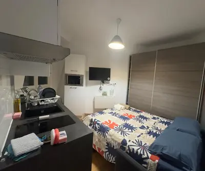 Un ou plusieurs lits dans un hébergement de l'établissement Apartamento Paris 15