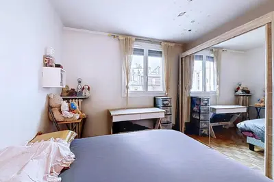 Un ou plusieurs lits dans un hébergement de l'établissement Charmant appartement près des Batignolles