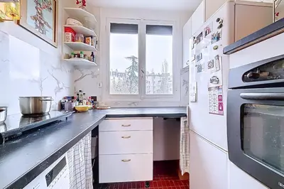 Cuisine ou kitchenette dans l'établissement Charmant appartement près des Batignolles