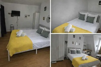 Un ou plusieurs lits dans un hébergement de l'établissement Appartement République proche du marais Folie Mericourt