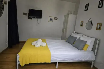 Un ou plusieurs lits dans un hébergement de l'établissement Appartement République proche du marais Folie Mericourt