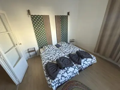 Un ou plusieurs lits dans un hébergement de l'établissement Bright and Comfortable Apartment for 6 Near Paris