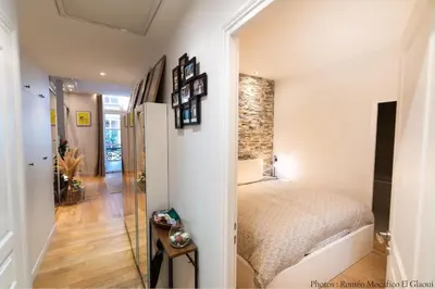 Un ou plusieurs lits dans un hébergement de l'établissement Louvre Suite a diamond in heart of Paris