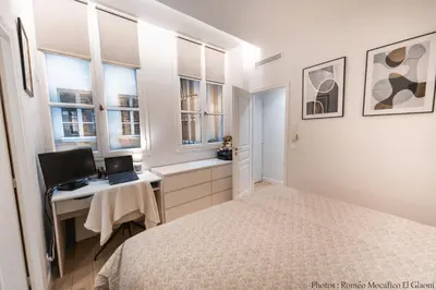 Un ou plusieurs lits dans un hébergement de l'établissement Louvre Suite a diamond in heart of Paris