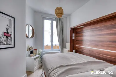 Un ou plusieurs lits dans un hébergement de l'établissement À 4 min du Sacré-Cœur Studio charmant