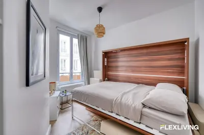 Un ou plusieurs lits dans un hébergement de l'établissement À 4 min du Sacré-Cœur Studio charmant