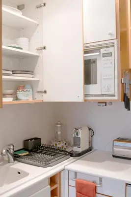 Cuisine ou kitchenette dans l'établissement Serenty - 1BR - Eiffel Tower & Les Invalides