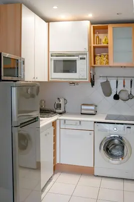 Cuisine ou kitchenette dans l'établissement Serenty - 1BR - Eiffel Tower & Les Invalides