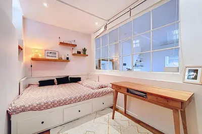 Coin salon dans l'établissement Spacieux Apt Oberkampf près Bastille