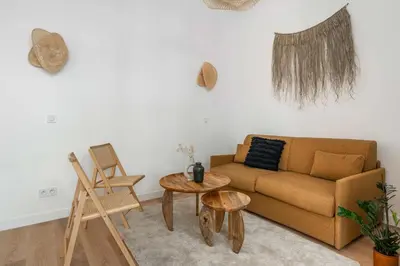 Coin salon dans l'établissement Appartement cosy pour 4 Paris
