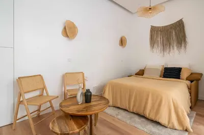 Un ou plusieurs lits dans un hébergement de l'établissement Appartement cosy pour 4 Paris