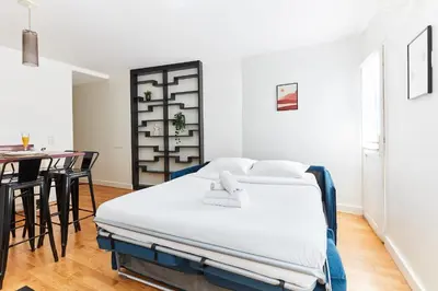 Un ou plusieurs lits dans un hébergement de l'établissement Serenty - Latin Quarter - 1BR with Balcony