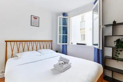 Un ou plusieurs lits dans un hébergement de l'établissement Serenty - Latin Quarter - 1BR with Balcony