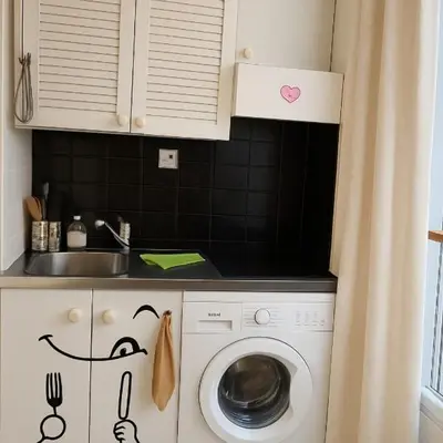 Cuisine ou kitchenette dans l'établissement Jolie appartement au centre de Paris