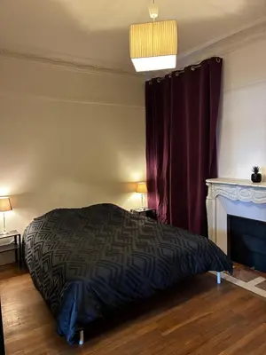 Un ou plusieurs lits dans un hébergement de l'établissement Superbe appartement pour 7 personnes
