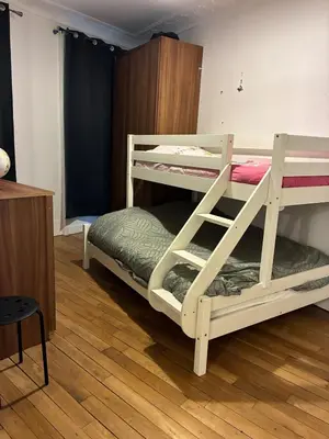Un ou plusieurs lits dans un hébergement de l'établissement Superbe appartement pour 7 personnes