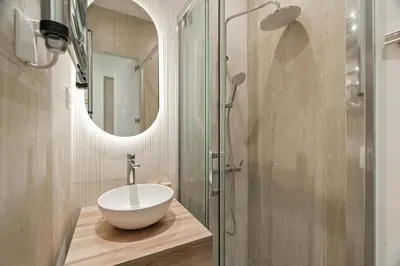 Salle de bains dans l'établissement Charmante suite paris 17E