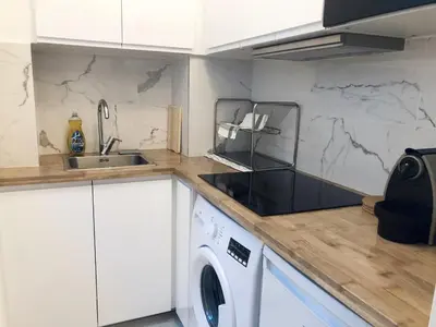 Cuisine ou kitchenette dans l'établissement Superbe appartement flambant neuf au centre de Paris