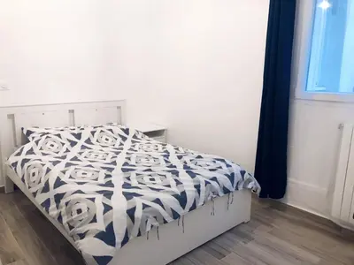 Un ou plusieurs lits dans un hébergement de l'établissement Superbe appartement flambant neuf au centre de Paris