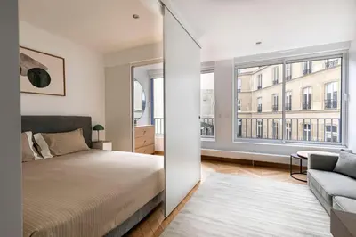 Un ou plusieurs lits dans un hébergement de l'établissement Suite Arc de Triomphe, Étoile, Champs-Elysees
