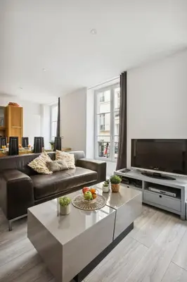 Coin salon dans l'établissement Serenty - 1BR - St Germain & Jardin du Luxembourg