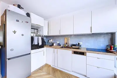 Cuisine ou kitchenette dans l'établissement Charmant appart proche Place d'Italie