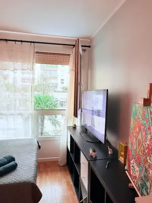 Télévision ou salle de divertissement dans l'établissement Apparemment agréable