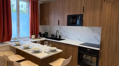 Cuisine ou kitchenette dans l'établissement Appartement neuf dans le centre de clamart à 8 min de train de Montparnasse